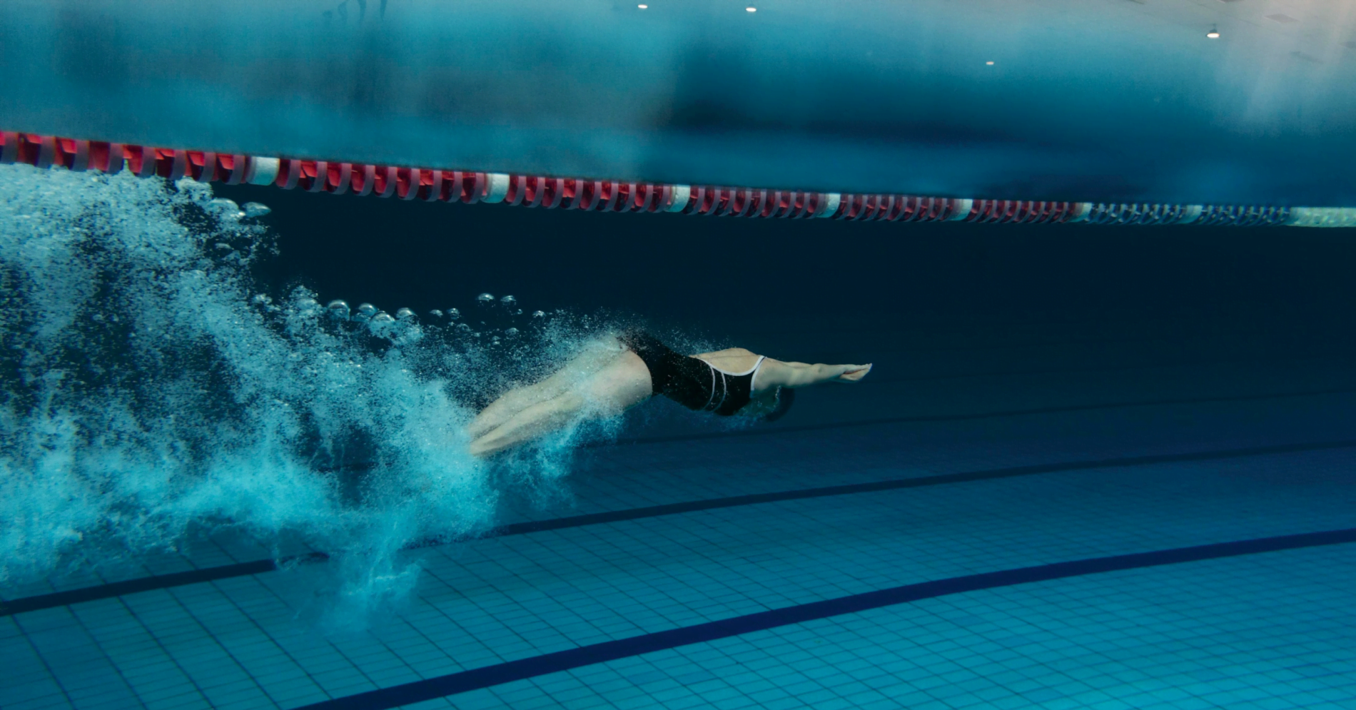 swimmer underwater in pool