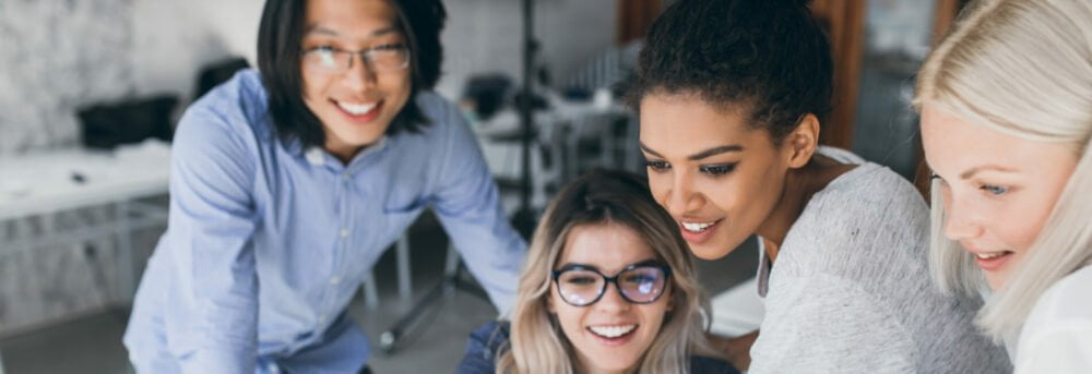 office group looking at screen